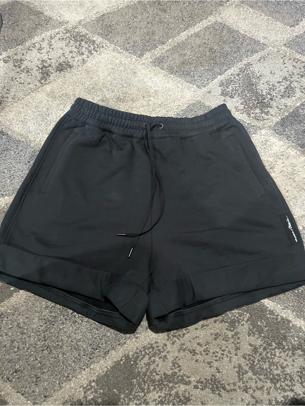 3.1 Phillip Lim Terry cotton short an elasticated drawstring waist side pockets.